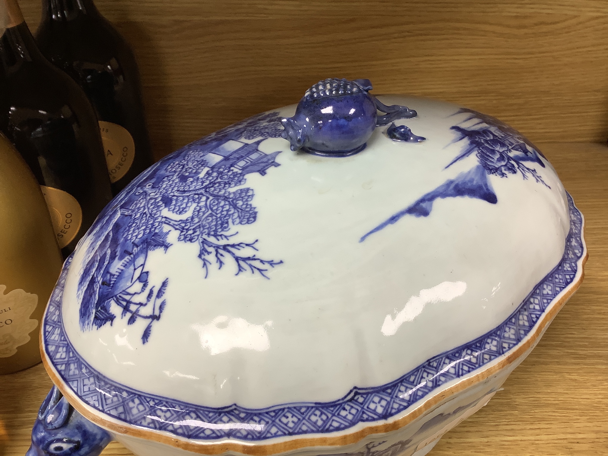 A 18th century Chinese export blue and white tureen and cover pomegranate finial, length 35cm